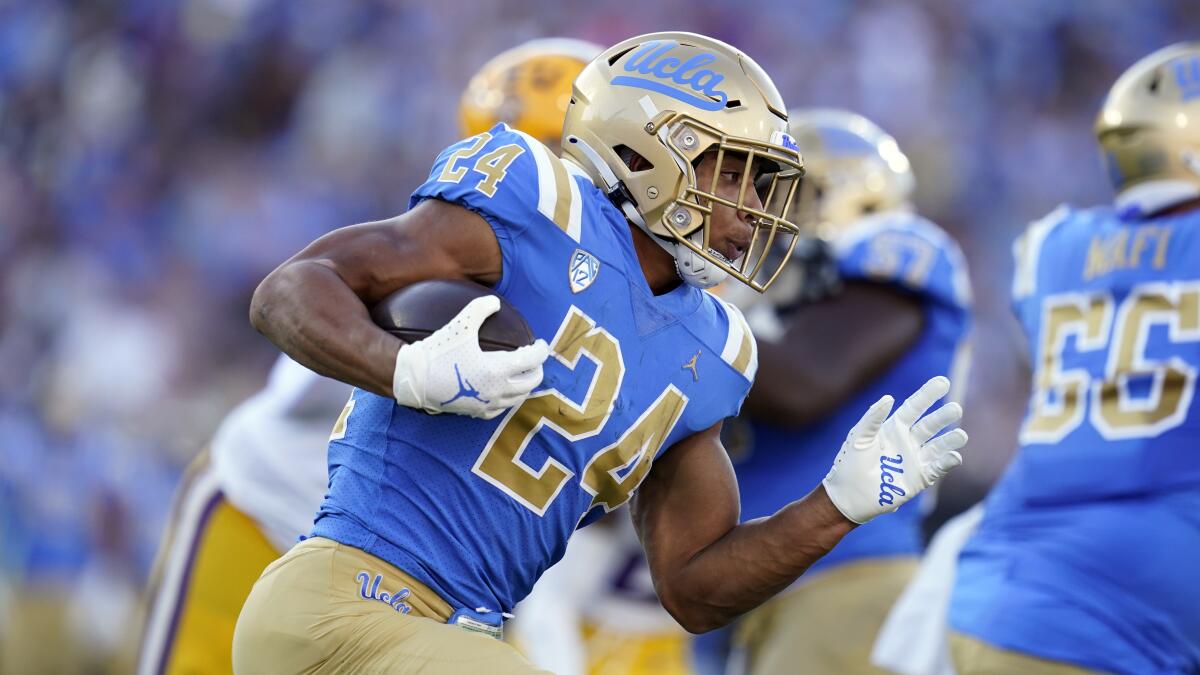 UCLA running back Zach Charbonnet carries the ball during a win over Louisiana State on Sept. 4.
