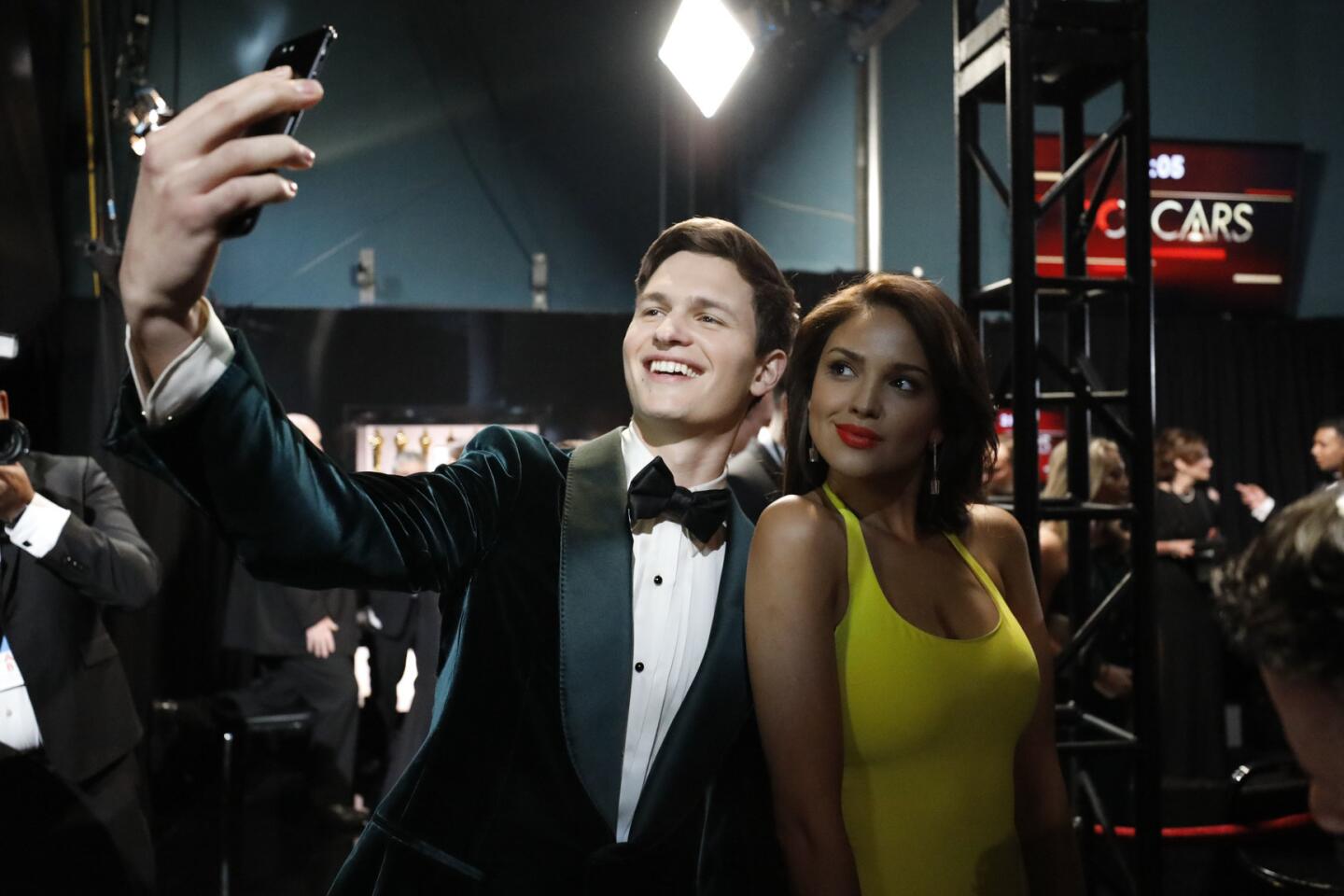 Ansel Elgort and Eiza Gonzalez backstage at the 90th Academy Awards on Sunday at the Dolby Theatre in Hollywood.