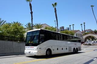After a 30-hour plus ride, a chartered bus carrying 30 immigrants from Texas arrives at Union Station in Los Angeles on Thursday, July 13, 2023.
