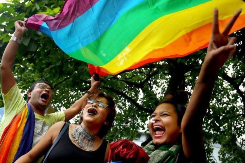 Mandatory Credit: Photo by PIYAL ADHIKARY/EPA-EFE/REX/Shutterstock (9870538d) Indian activists of the lesbian, gay, bisexual, and transgender (LGBT) community celebrate during a rally after the verdict at the Supreme Court in Kolkata, Eastern India, 06 September 2018. India's Supreme Court ruled on 06 September 2018, that gay sex is no longer a criminal offence. Five Supreme Court judges repealed a colonial-era law (section 377) and legalize gay sex between consenting adults. LGBT celebratation in Kolkata, India - 06 Sep 2018 ** Usable by LA, CT and MoD ONLY **