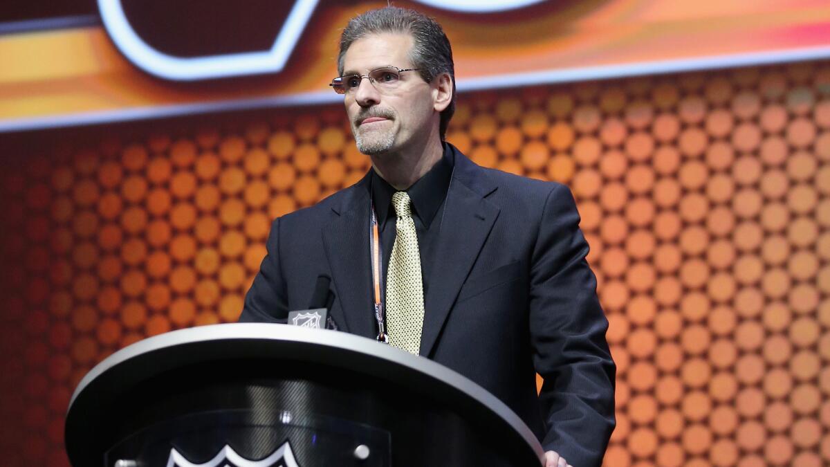 Philadelphia Flyers General Manager Ron Hextall speaks during the first round of the 2014 NHL Draft in Philadelphia in June.