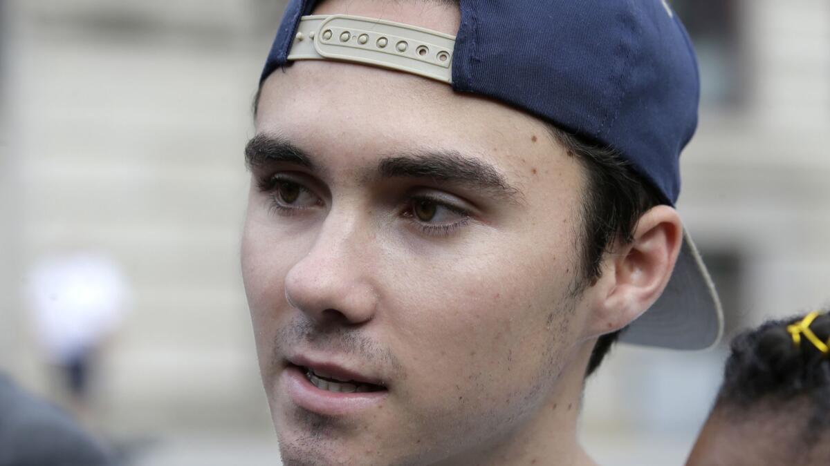 David Hogg became a gun control activist after surviving the mass shooting at Marjory Stoneman Douglas High School in Parkland, Fla. Above, he attends an August demonstration in Worcester, Mass.