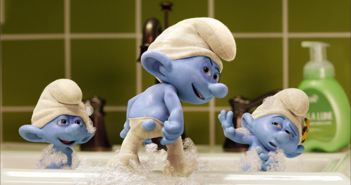 Clumsy (Anton Yelchin), Grouchy (George Lopez) and Vanity (John Oliver) in "Smurfs 2." (Columbia Pictures)