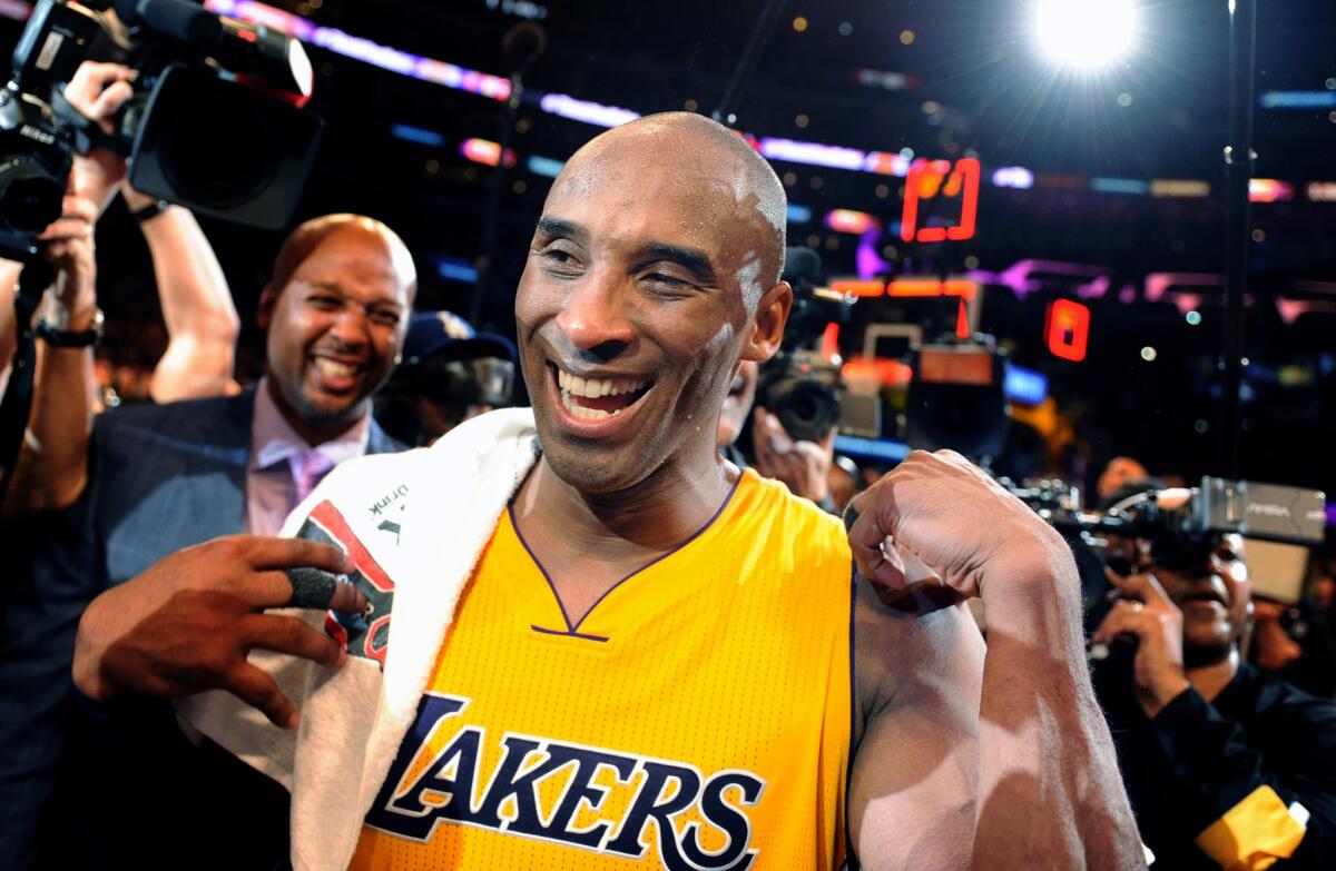 Kobe Bryant is all smiles after his final game at Staples Center.