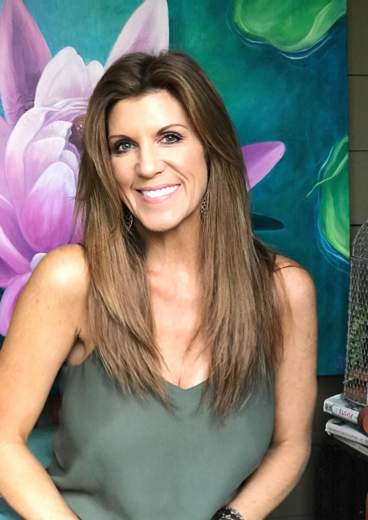Debbie Avoux is working on "Fathoms," a mural to be installed in June on the wall of a Pacific Beach apartment complex.