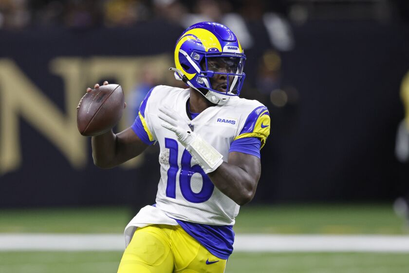 Rams quarterback Bryce Perkins looks to pass against the New Orleans Saints during the second half Nov. 20, 2022.