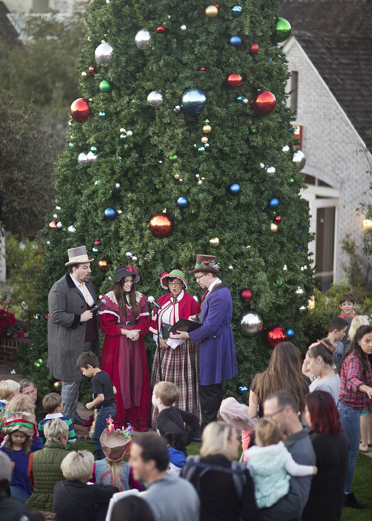 The Tinseltown Carolers perform at a previous Santa by the Sea event in Del Mar.