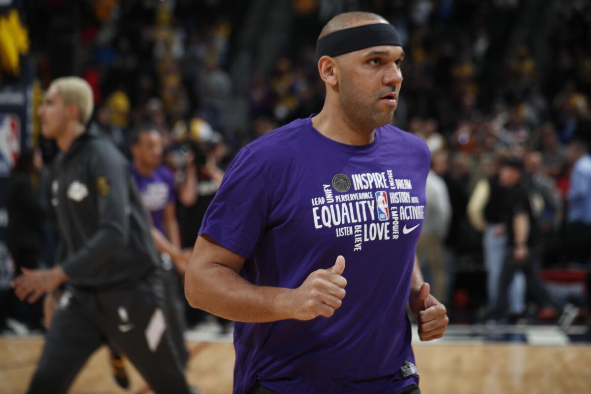 Lakers forward Jared Dudley warms up before a game against the Nuggets on Feb. 12, 2020, in Denver.