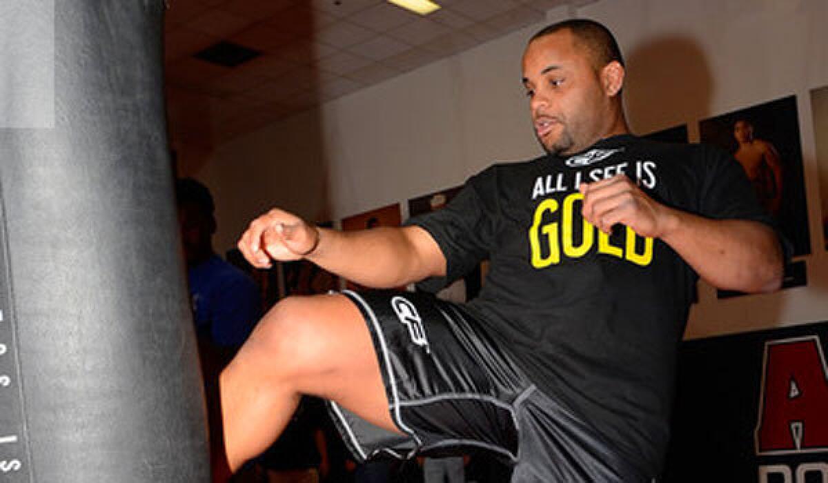 Daniel Cormier, working out at AKA San Jose, will get a title shot against Jon Jones on Sept. 27