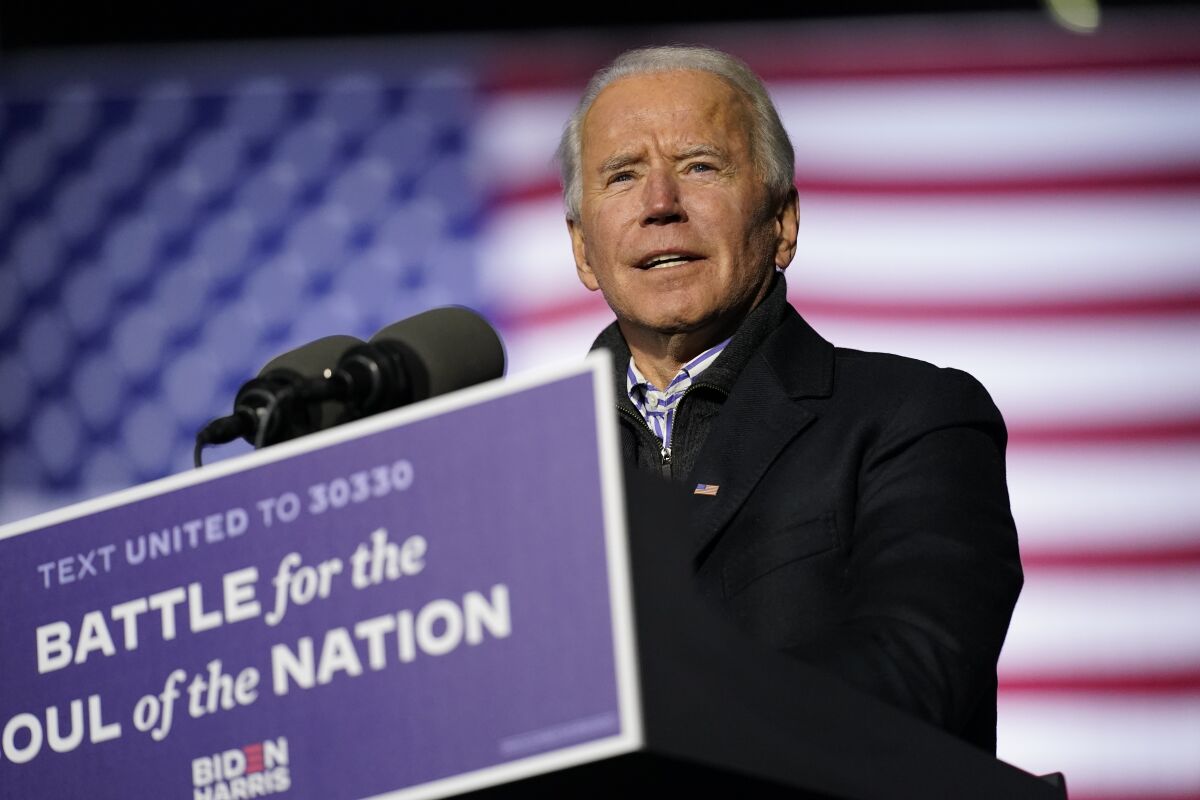 Former Vice President Joe Biden speaks during a drive-in rally at Heinz Field, on Monday, Nov. 2, 2020, in Pittsburgh.