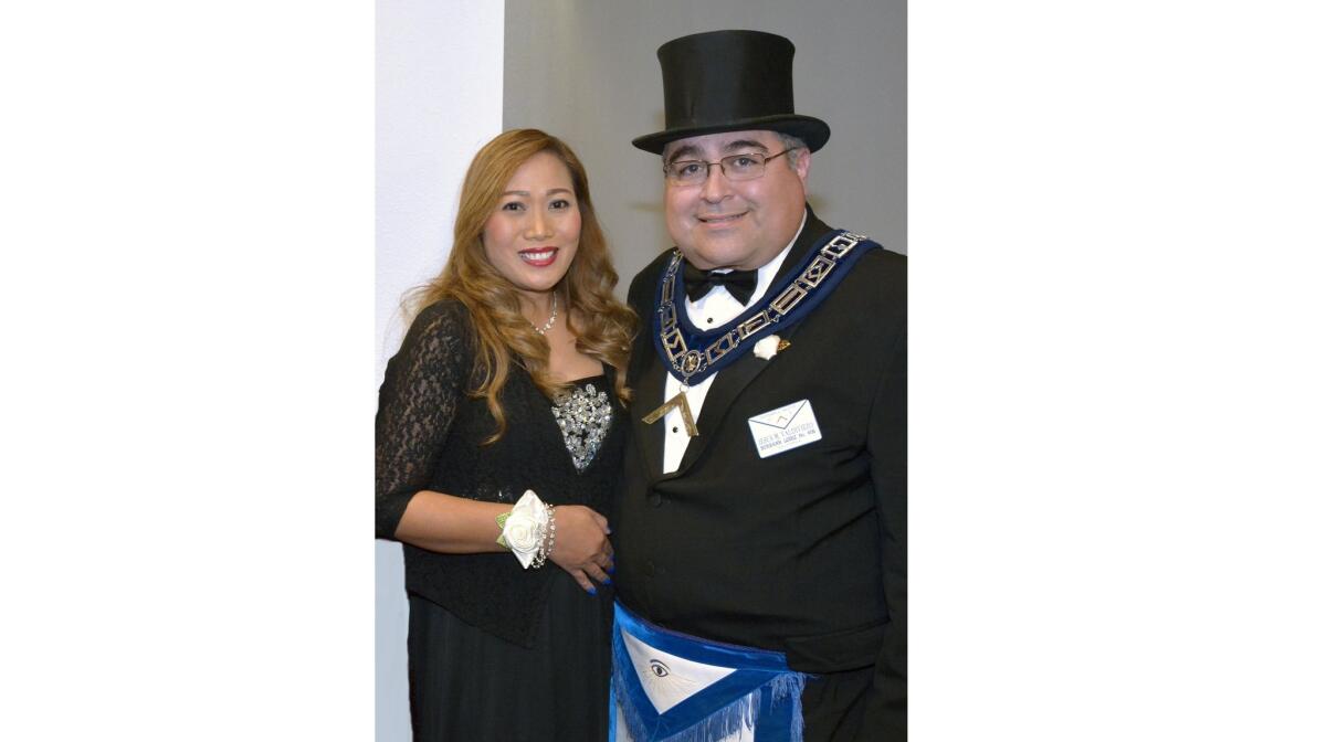 Elizabeth and Jesus Valdiviezo greeted the assemblage of Masons, family members, and friends following last week's installation ceremony.