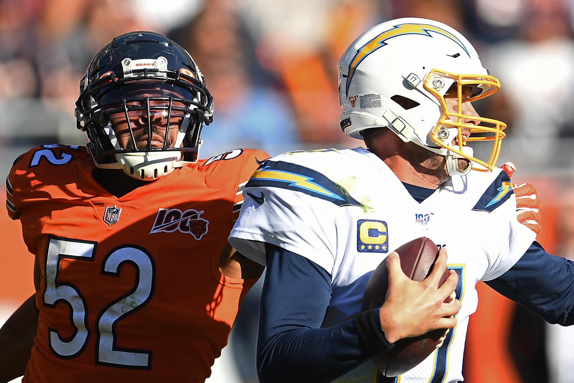 The Bears' Khalil Mack (52) pressures Chargers quarterback Philip Rivers in 2019.