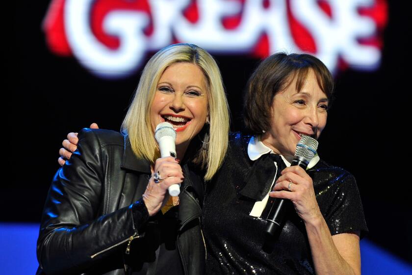 Together again: Olivia Newton-John, left, and actress Didi Conn shared the stage Jan. 3 at the Flamingo Las Vegas. The two starred in the 1978 movie "Grease."