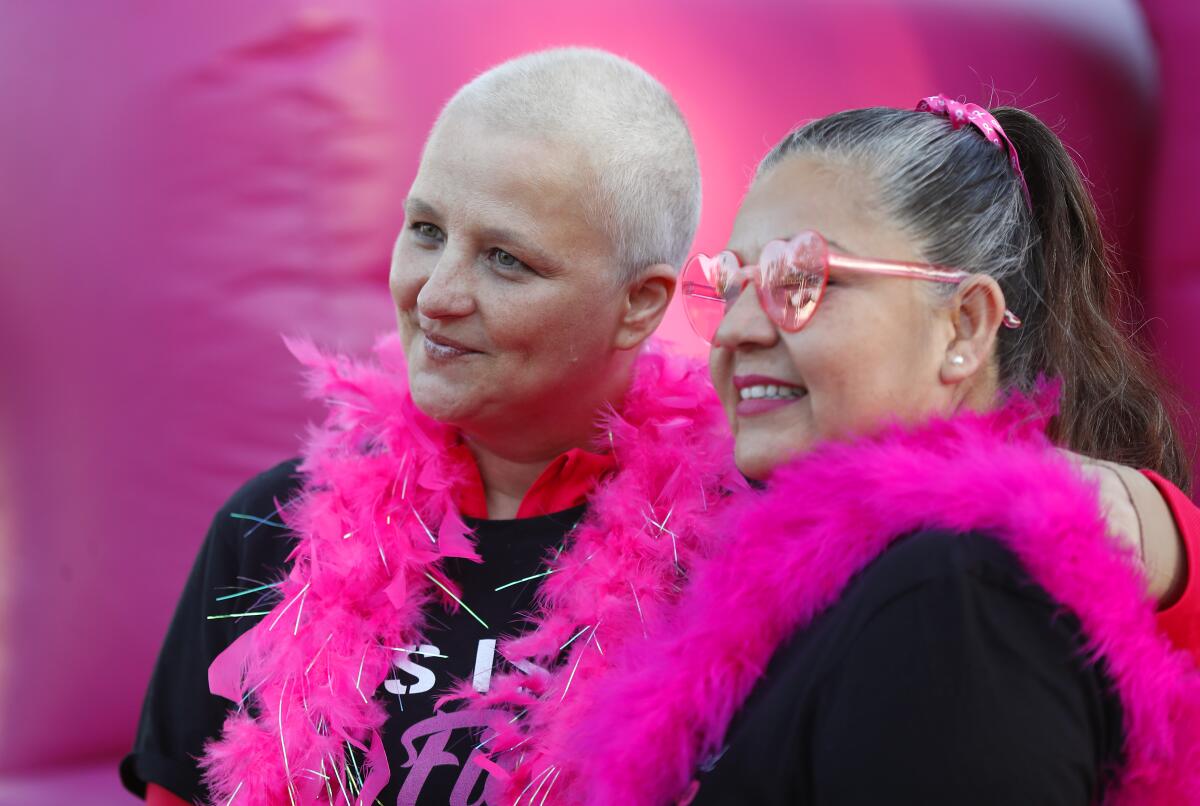 Babett Hirzel, left, and friend Irlanda Serrano take a photo after the American Cancer Society Mak