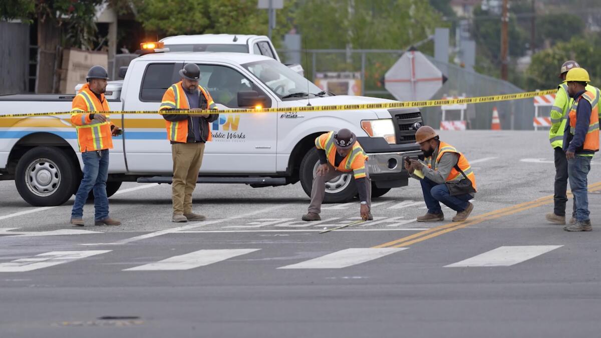 Crude oil spills onto Cesar Chavez Avenue in East L.A. after pipeline rupture