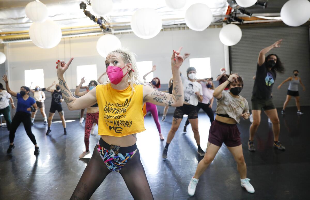 Emilia Richeson-Valiente teaches an aerobics class.