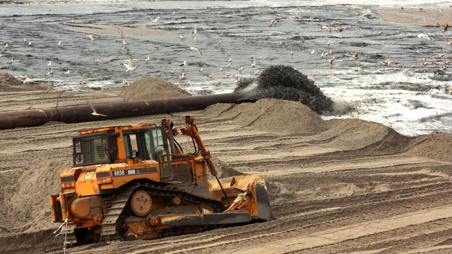 A large sand project is underway at Rockaway Beach to replenish the beach lost during Hurricane Sandy. The operation was in full swing days before Memorial Day weekend and the opening of beach season.