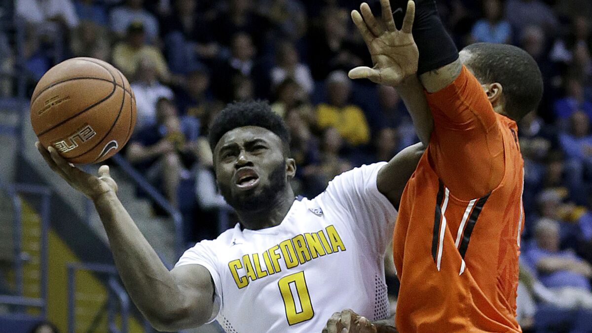 Jaylen Brown drives to the basket against an Oregon State defender during a game on Feb. 13.