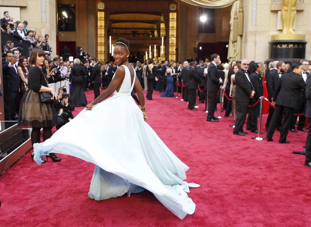 Lupita Nyong'o arrives at the 86th Annual Academy Awards 