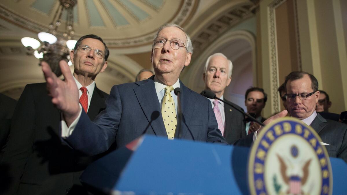 Senate Majority Leader Republican Mitch McConnell speaks on a Republican-crafted healthcare bill during a news conference on June 20)