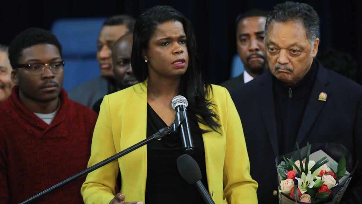 Cook County State's Atty. Kim Foxx, center, joined by Jesse Jackson Sr. and other supporters at a news conference.