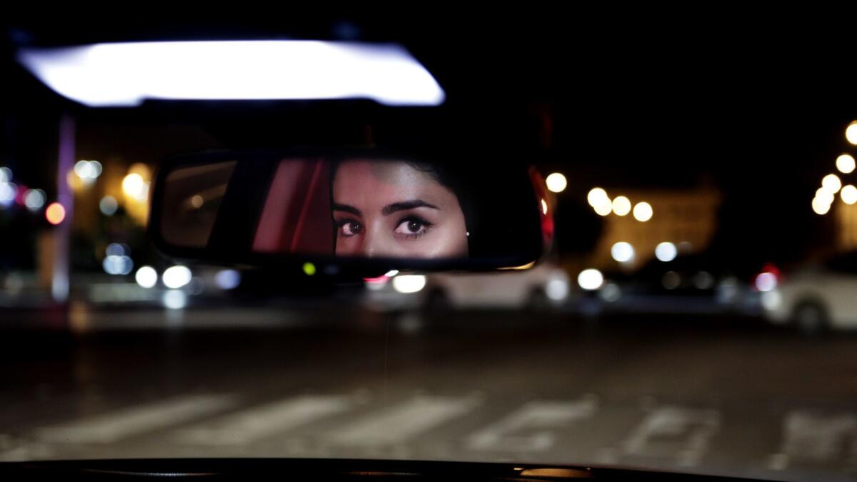 Hessah al-Ajaji drives her car in Riyadh, Saudi Arabia. Saudi women are driving freely for the first time after decades of risking arrest if they got behind the wheel.