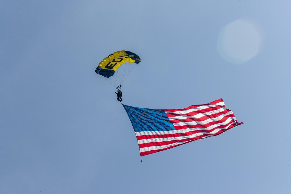 Walter Moskal, an E6 with the U.S. Navy Leap Frogs, parachutes in to the Los Alamitos Joint Forces Training Base on Thursday.