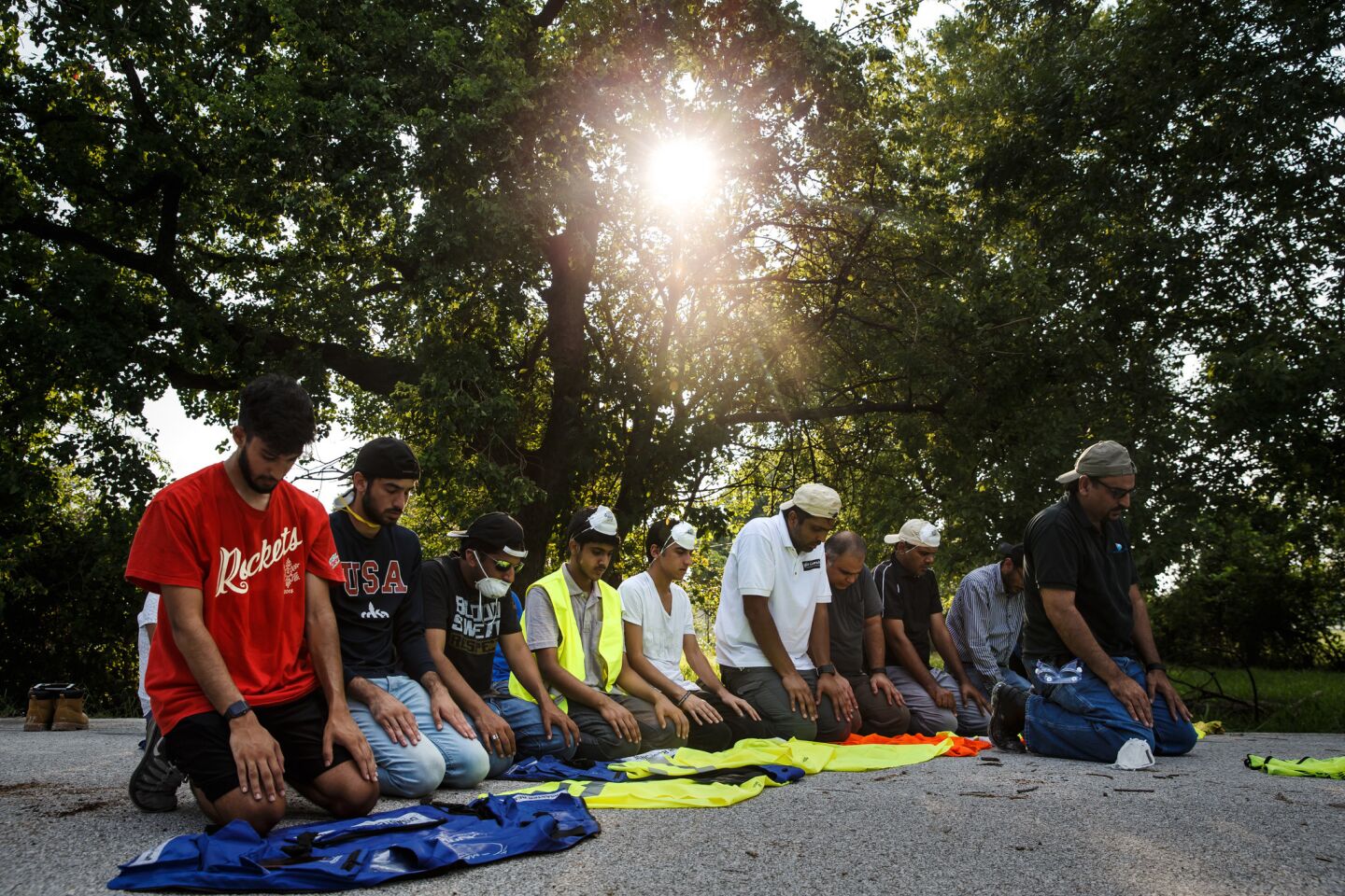 Volunteers from the Ahmadiyya Muslim Youth Association to perform holy prayer as they help local residents in the Kashmere Gardens area of Houston clean out their flooded homes.