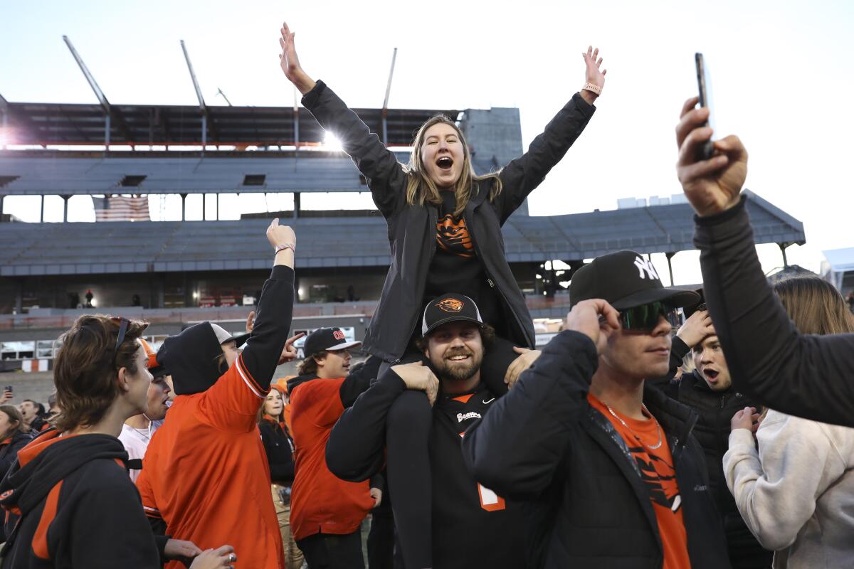 Oregon State fans celebrate after a win over rival Oregon in November.
