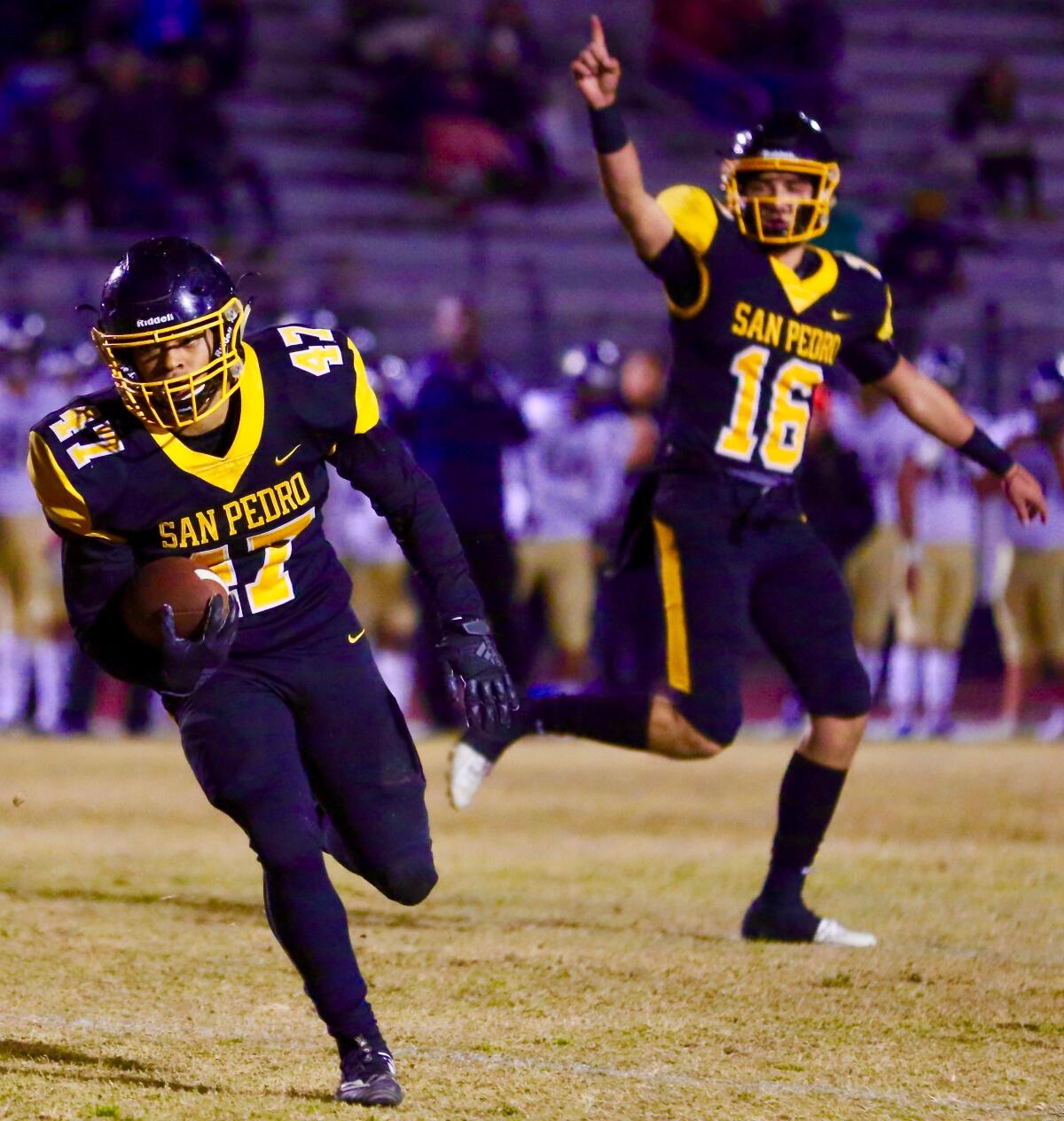 Josh Ward scores on a two-yard run to put San Pedro on the scoreboard first in Friday night’s City Section Open Division semifinal against Birmingham on Friday.