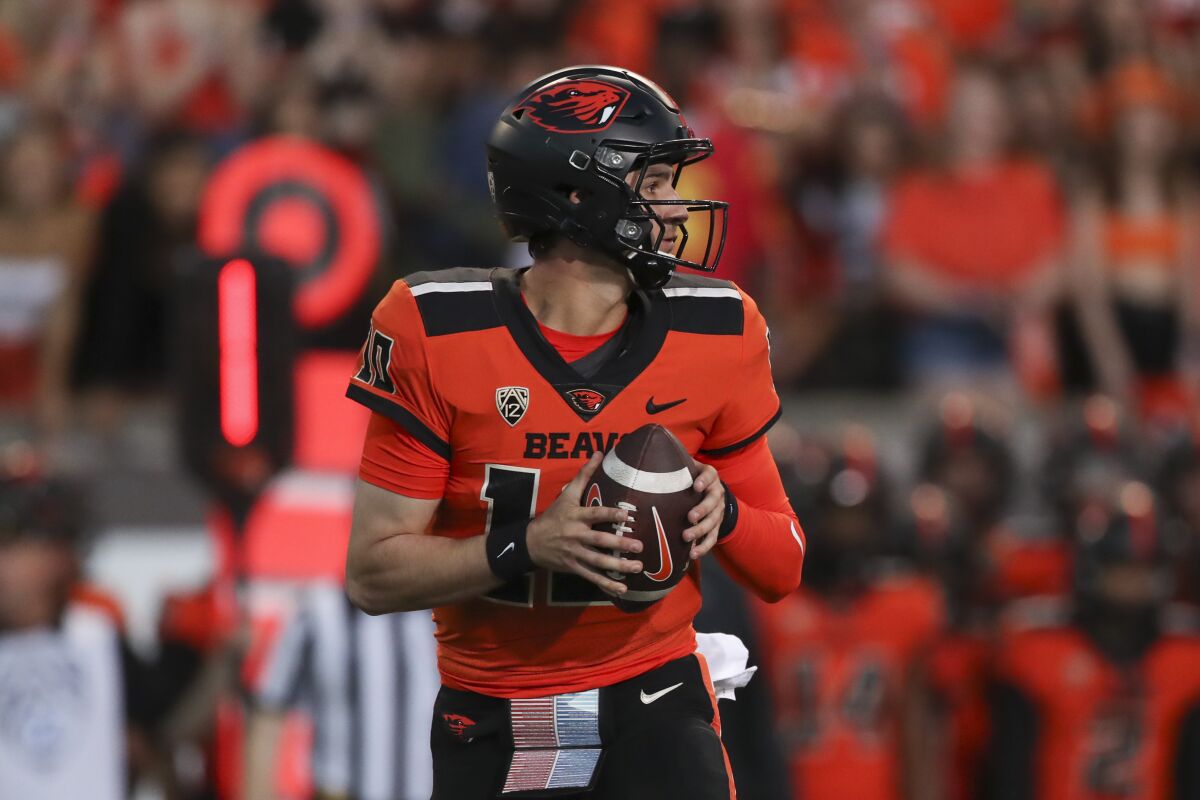 Oregon State quarterback Chance Nolan drops back to pass against Southern California during the first half of an NCAA college football game Saturday, Sept. 24, 2022, in Corvallis, Ore. (AP Photo/Amanda Loman)