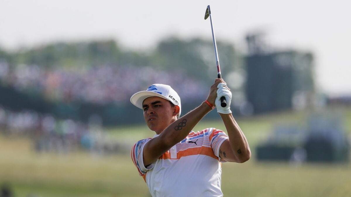 Rickie Fowler hits on the 12th hole during the first round of the U.S. Open on June 15 at Erin Hills.