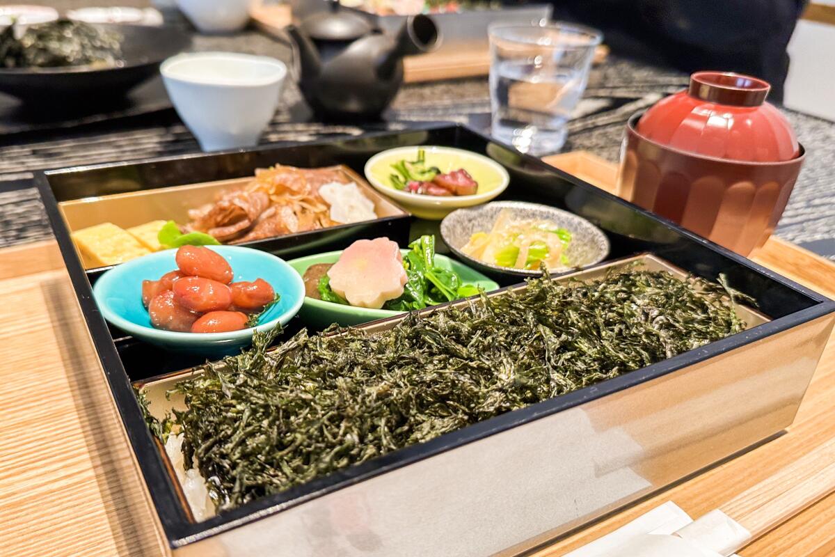 A lunchtime bento, which includes rice covered in shredded nori, at the Yamamotoyama tea shop in Tokyo's Ginza district.