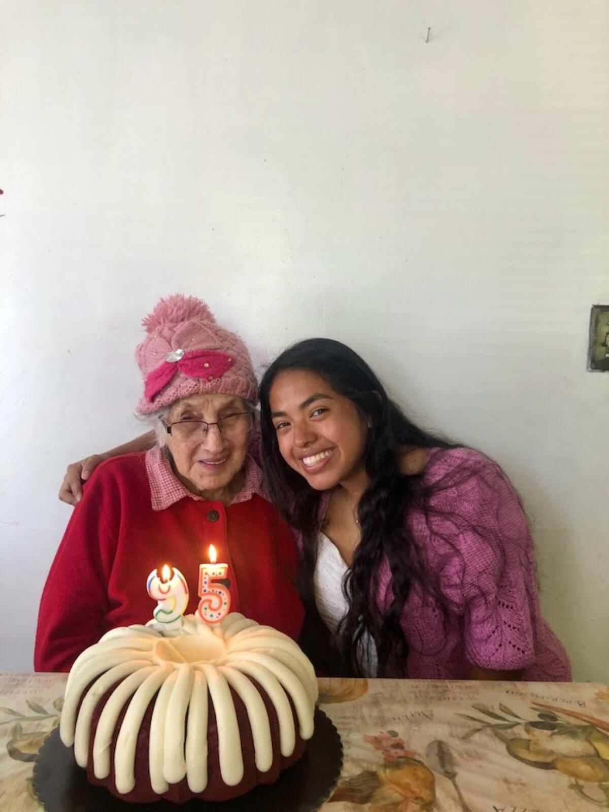 Ruth Alcantara and her grandmother on April 3, shortly after their first hug in 14 months.