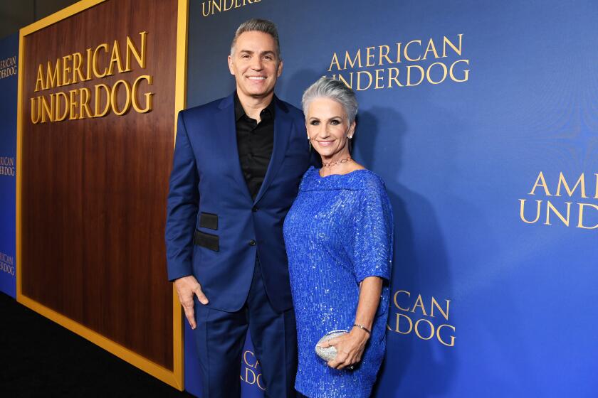 HOLLYWOOD, CALIFORNIA - DECEMBER 15: (L-R) Kurt Warner and Brenda Warner attend the "American Underdog" Premiere at TCL Chinese Theatre on December 15, 2021 in Hollywood, California. (Photo by Jon Kopaloff/Getty Images for Lionsgate)