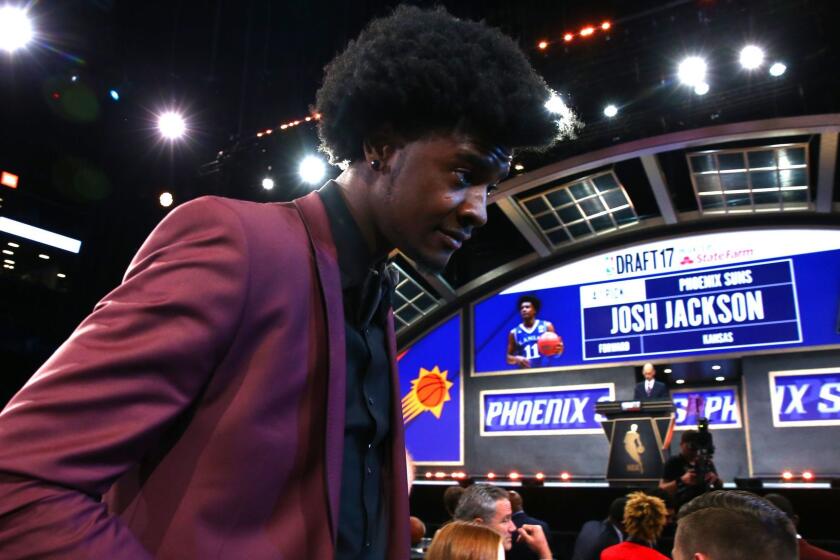 NEW YORK, NY - JUNE 22: Josh Jackson walks to the stage after being drafted fourth overall by the Phoenix Suns during the first round of the 2017 NBA Draft at Barclays Center on June 22, 2017 in New York City. NOTE TO USER: User expressly acknowledges and agrees that, by downloading and or using this photograph, User is consenting to the terms and conditions of the Getty Images License Agreement. (Photo by Mike Stobe/Getty Images) ** OUTS - ELSENT, FPG, CM - OUTS * NM, PH, VA if sourced by CT, LA or MoD **