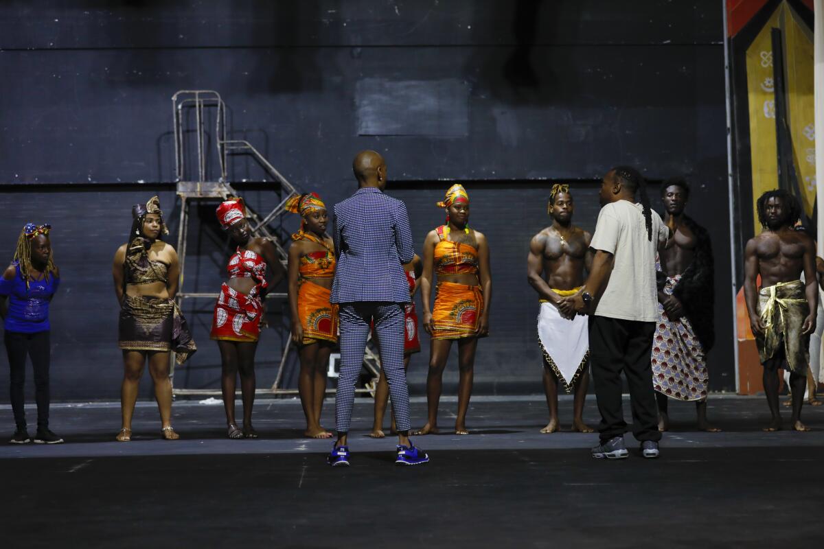 Dajahn Blevins directs the cast during a Kuumba Fest dress rehearsal.