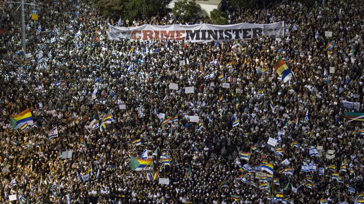 The rally against Israel's new law on national identity drew a vast crowd to Rabin Square in Tel Aviv.