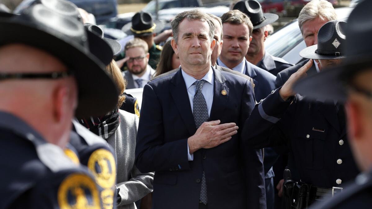 Gov. Ralph Northam, shown here at the funeral of Virginia State Trooper Lucas B. Dowell on Saturday in Chilhowie, Va., said Sunday on CBS’ “Face the Nation” that “Virginia needs someone that can heal. There’s no better person to do that than a doctor."