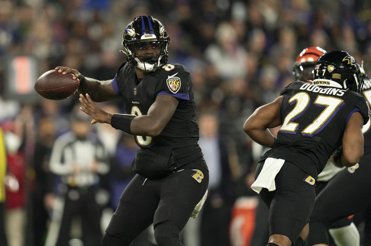 Baltimore Ravens quarterback Lamar Jackson looks to pass against the Cincinnati Bengals.