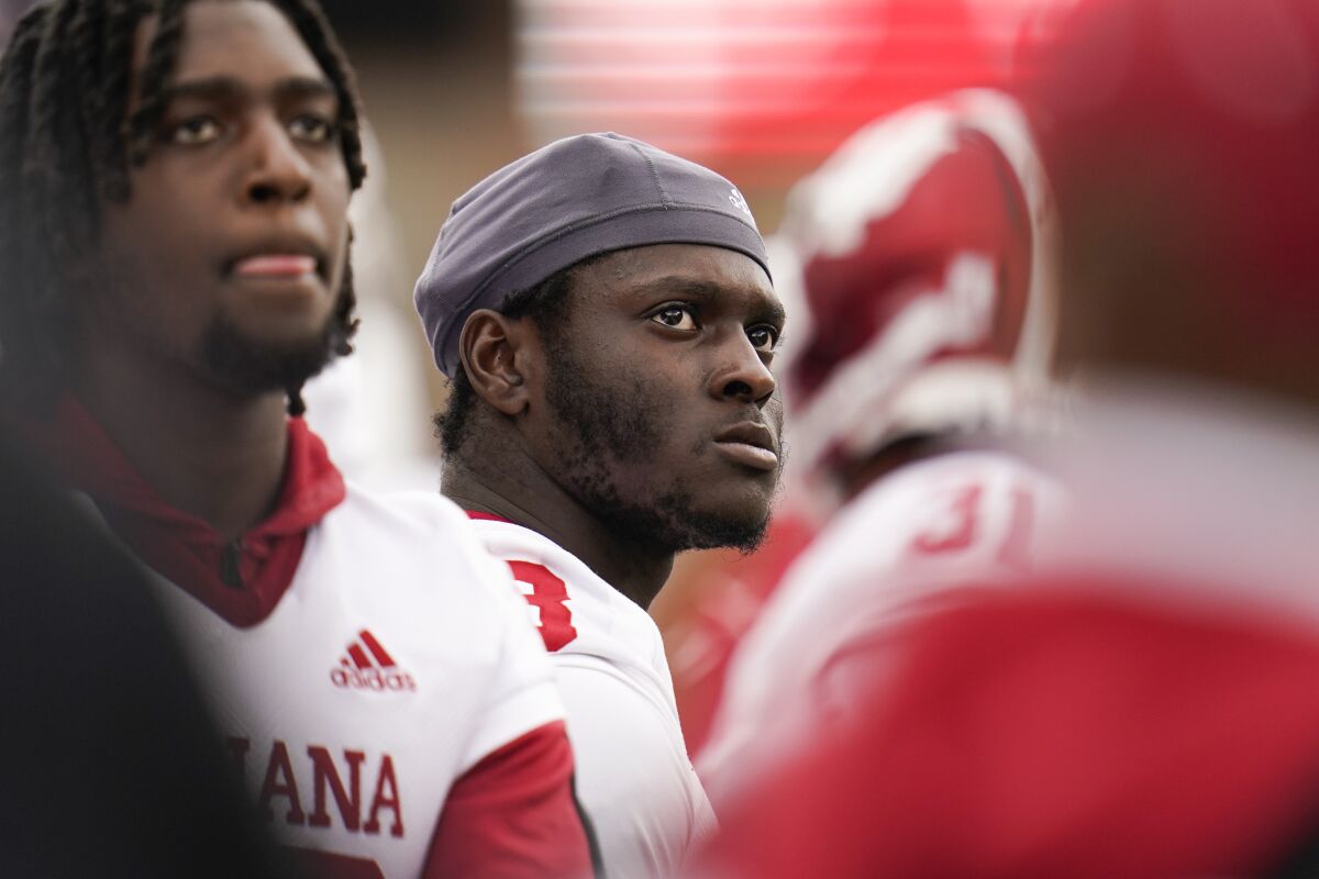Indiana defensive back Tiawan Mullen looks on from the sideline during the second half of an NCAA college football game against Maryland, Saturday, Oct. 30, 2021, in College Park, Md. Maryland won 38-35. (AP Photo/Julio Cortez)