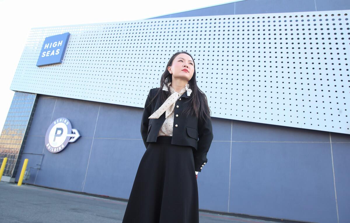 Rachel Xin stands outside her High Seas cannabis boutique in Costa Mesa.