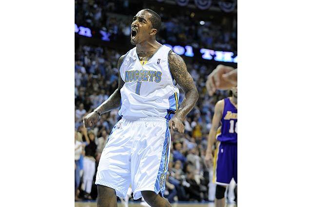 Nuggets J.R. Smith celebrates his dunk against the Lakers in Game 4 of the Western Conference Finals in Denver.