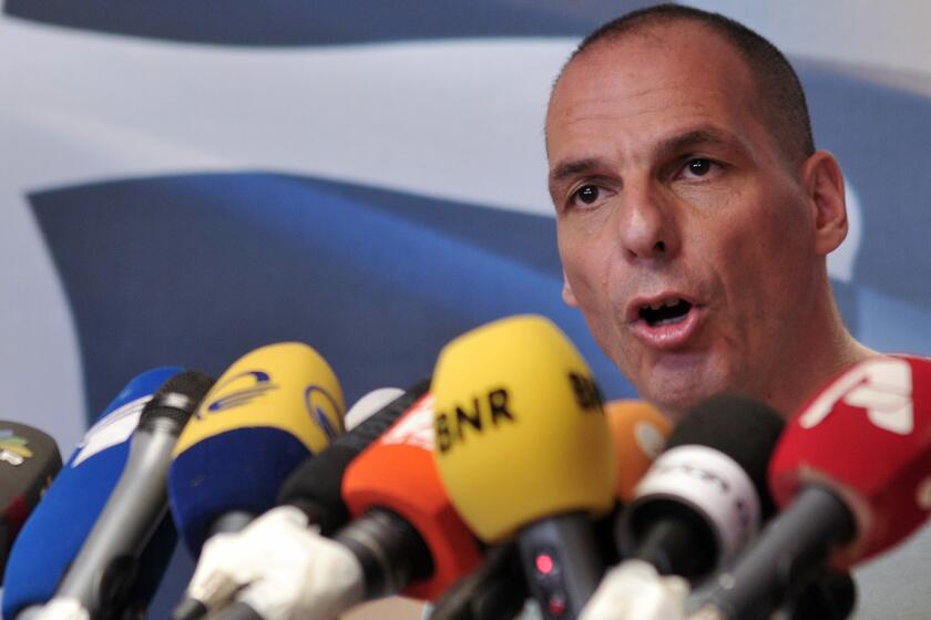 Greek Finance Minister Yanis Varoufakis speaks Sunday in Athens after the results of the bailout referendum.