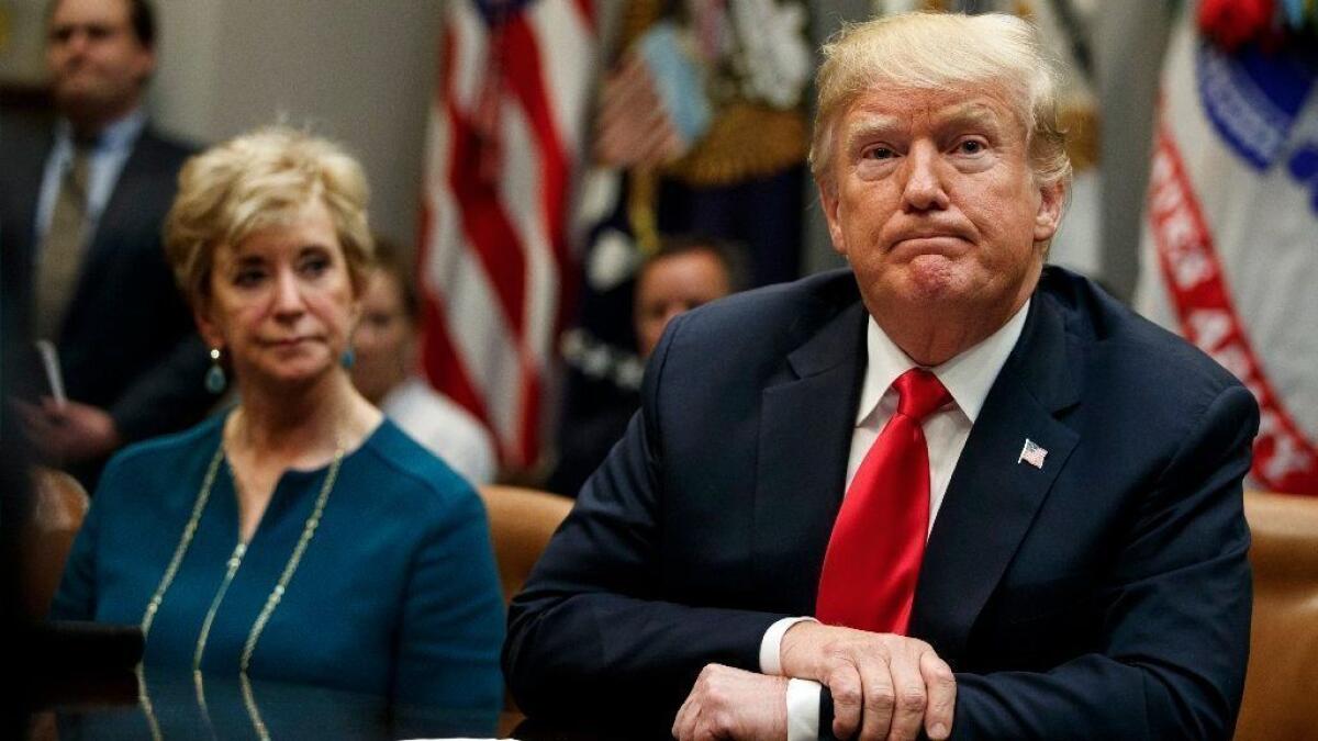 President Trump listens during a meeting of the National Council of the American Worker at the White House on Sept. 17.