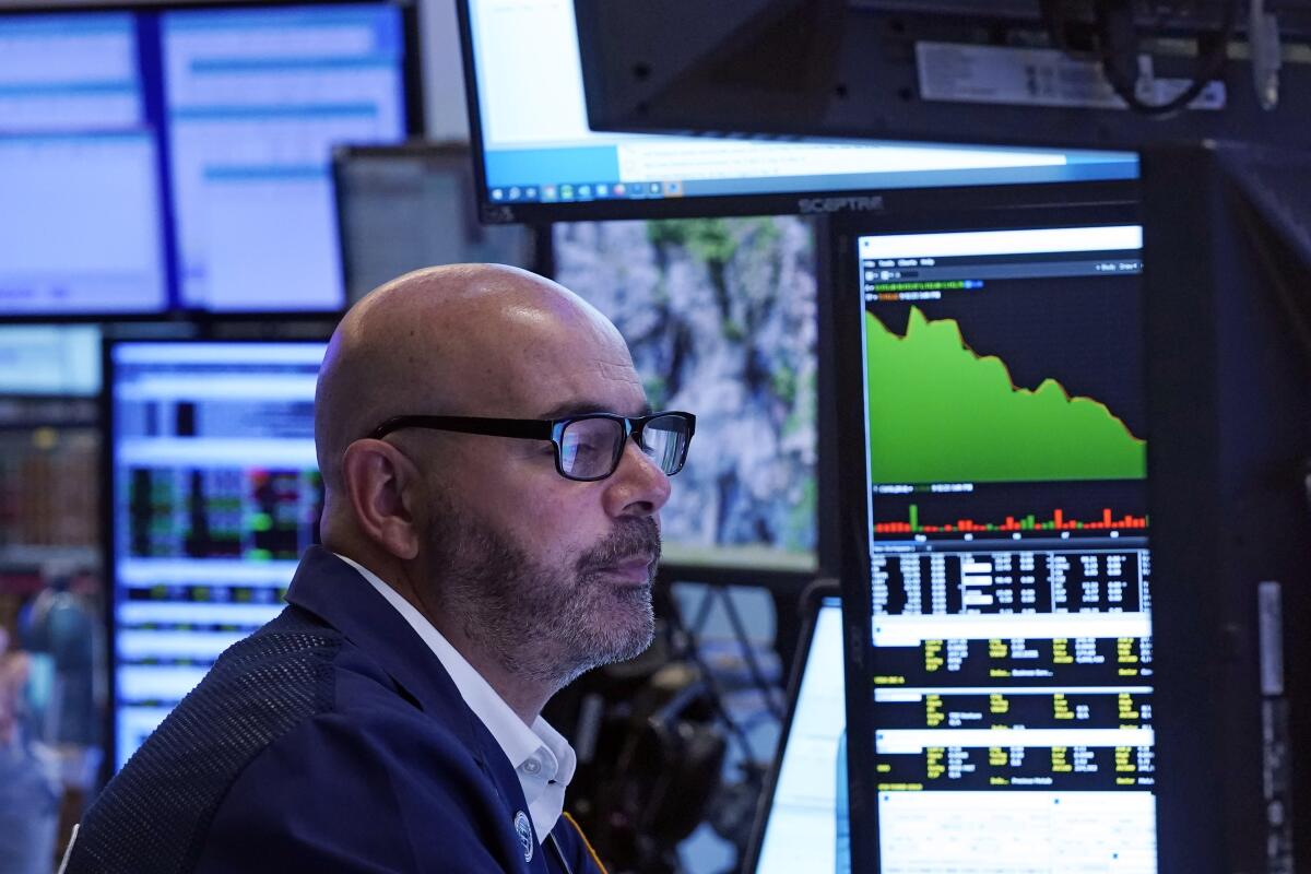Trader Fred DeMarco works on the floor of the New York Stock Exchange