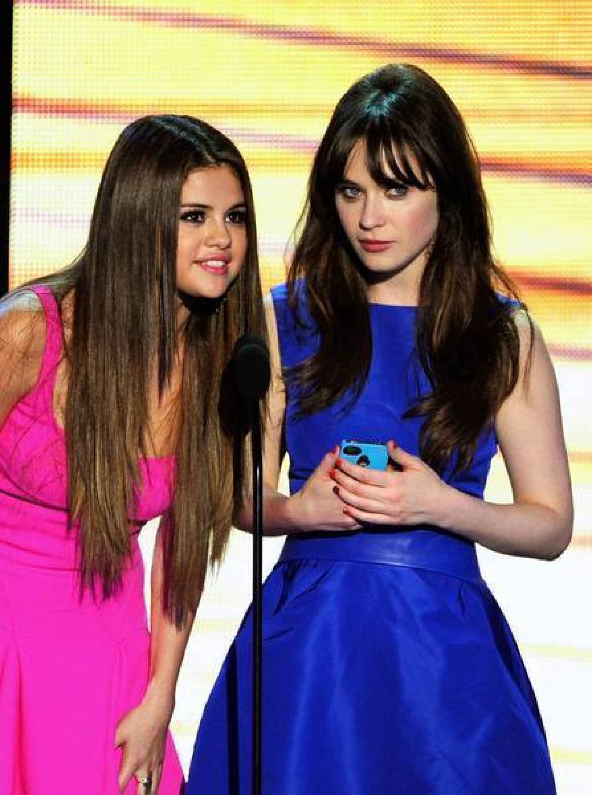Selena Gomez, left, and Zooey Deschanel have looks teens relate to.