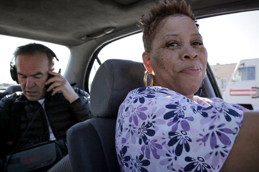 Pam Brooks, front, plays the guide in the film. Director Nick Broomfield is pictured the back seat.