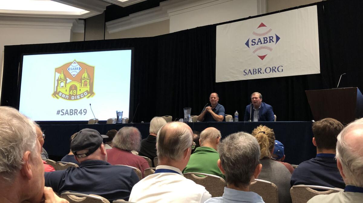 Former MLB executive Mike Port (left) and current umpire Gerry Davis were the featured speakers on Saturday morning for the umpiring panel at the 49th annual SABR convention held downtown at the Manchester Grand Hyatt San Diego.