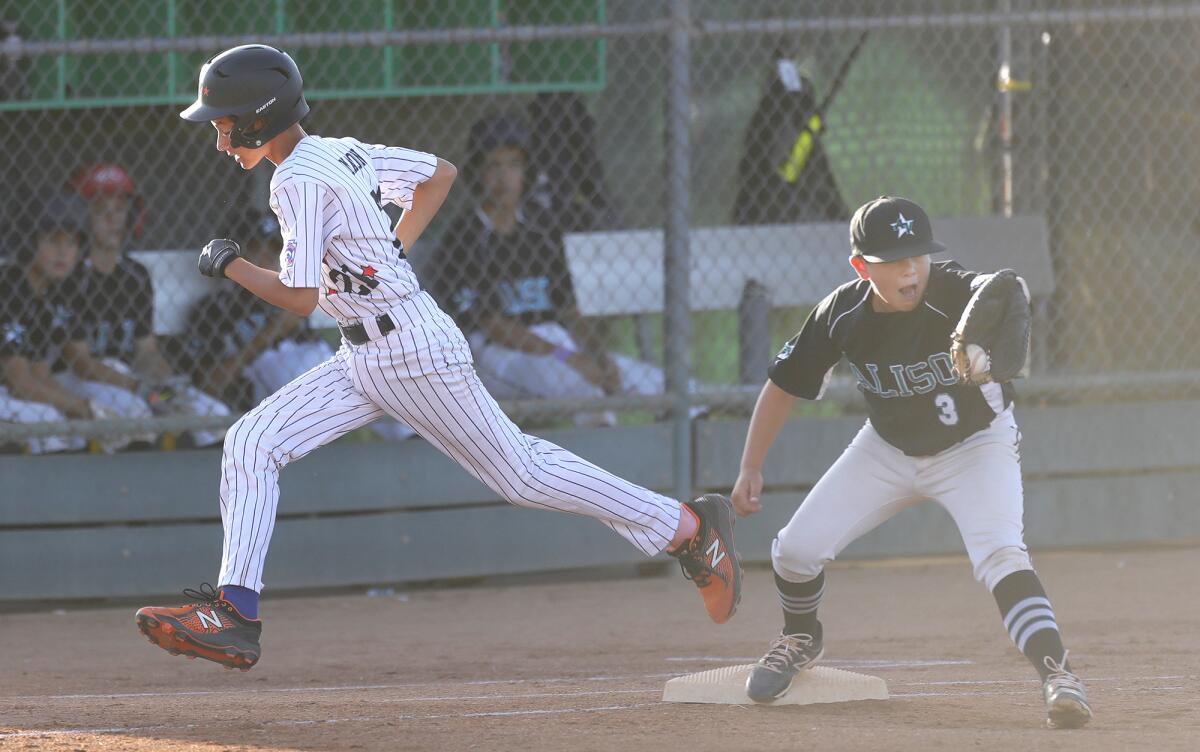 Huntington Valley's Ely Mason beats the throw to first during the Section 10 Little League All-Star tournament final.